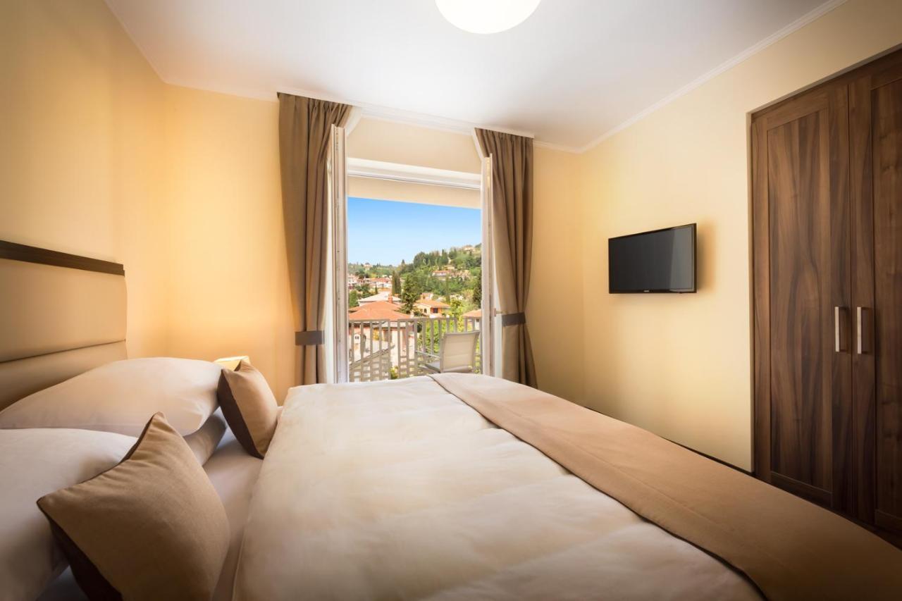 Remisens Casa Rosa - Hotel Metropol Annexe 波尔托罗 客房 照片